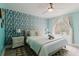 Stylish bedroom with a ceiling fan, a neutral color palette, and ample natural light at 3675 41St S Way # K, St Petersburg, FL 33711