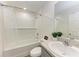 Bright bathroom with subway tile surround and neutral colored vanity at 3879 E Price Blvd, North Port, FL 34288