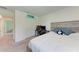 Bedroom with desk, closet, and neutral colored walls at 3879 E Price Blvd, North Port, FL 34288