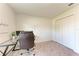 Well-lit home office featuring a comfortable desk chair, sleek desk, and inspirational wall art at 3879 E Price Blvd, North Port, FL 34288
