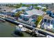 A screened-in lanai with pool and boat dock on a waterfront canal property at 426 Islebay Dr, Apollo Beach, FL 33572