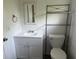 Cozy bathroom featuring tile floors, modern toilet, and new vanity at 4316 70Th N Ave, Pinellas Park, FL 33781