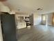 Bright kitchen featuring stainless steel appliances, white cabinets and light gray backsplash at 4316 70Th N Ave, Pinellas Park, FL 33781
