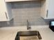Close-up of kitchen sink and backsplash at 4316 70Th N Ave, Pinellas Park, FL 33781