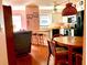 Open kitchen with butcher block counters and white cabinetry at 4556 Blossom Blvd # B, Zephyrhills, FL 33542