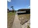Community parking lot with covered parking at 4556 Blossom Blvd # B, Zephyrhills, FL 33542