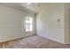 Cozy bedroom with carpet, crown moulding, a ceiling fan, and a bright window view to the outside at 476 Denise St, Tarpon Springs, FL 34689