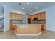 Stylish kitchen featuring granite countertops, stainless appliances, and a functional island at 476 Denise St, Tarpon Springs, FL 34689