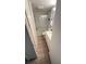 Bathroom with a glass shower and a built in storage cabinet at 4851 W Gandy Blvd # B12L28, Tampa, FL 33611
