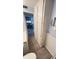 Bathroom with built-in storage and neutral color palette at 4851 W Gandy Blvd # B12L28, Tampa, FL 33611