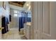 This cozy bathroom features a bathtub and shower combination, vanity, toilet, and closet at 522 Planters Manor Way, Bradenton, FL 34212
