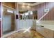 Bright bathroom with a garden tub, separate shower, and vanity with large mirror at 522 Planters Manor Way, Bradenton, FL 34212