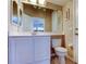 Small bathroom with a sink and toilet at 522 Planters Manor Way, Bradenton, FL 34212