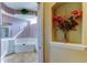 This full bathroom features a garden tub, patterned wallpaper and a tiled floor at 522 Planters Manor Way, Bradenton, FL 34212