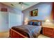 Comfortable bedroom with a full-sized bed and side tables at 522 Planters Manor Way, Bradenton, FL 34212