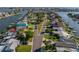 Charming neighborhood showcasing well-maintained homes, mature trees, and manicured lawns at 533 Lillian Dr, Madeira Beach, FL 33708