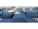 Waterfront home featuring a private dock with a boat lift and scenic water views at 533 Lillian Dr, Madeira Beach, FL 33708