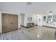 Spacious entryway with stone flooring, accent furniture and ample natural light at 533 Lillian Dr, Madeira Beach, FL 33708