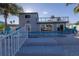 Beautiful backyard pool with balcony, patio, and ample space for entertaining at 533 Lillian Dr, Madeira Beach, FL 33708