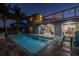 Enjoy the outdoor pool with deck, patio, and views to the interior spaces of the home at 533 Lillian Dr, Madeira Beach, FL 33708