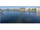 Scenic waterfront view showcases neighborhood homes and boat docks along the waterway at 533 Lillian Dr, Madeira Beach, FL 33708