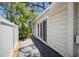 View of the backyard featuring a sliding door and shaded area at 568 La Plaza S Ave, St Petersburg, FL 33707