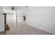 Spacious living room with tile flooring leads to the kitchen at 568 La Plaza S Ave, St Petersburg, FL 33707