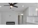 Bright living room featuring a ceiling fan, recessed lighting, and an electric fireplace at 5800 Dartmouth N Ave, St Petersburg, FL 33710