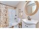 Full bathroom with vanity and shower-tub combo at 5906 Greenbriar Ct, Zephyrhills, FL 33542