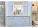 Bathroom with marble countertops and lighting at 5906 Greenbriar Ct, Zephyrhills, FL 33542