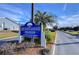 Community entrance sign for Wedgewood Manor, a 55 and over retirement community at 5906 Greenbriar Ct, Zephyrhills, FL 33542