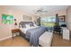 Relaxing bedroom with ample natural light and a peaceful outdoor view at 6191 Bahia Del Mar Blvd # 103, St Petersburg, FL 33715