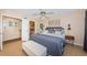 Comfortable bedroom with access to an en-suite bathroom at 6191 Bahia Del Mar Blvd # 103, St Petersburg, FL 33715