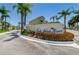 Elegant Vista Verde North community sign surrounded by lush tropical landscaping with multiple palm trees at 6191 Bahia Del Mar Blvd # 103, St Petersburg, FL 33715