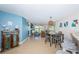 Open floor plan with dining area, living room, and kitchen, perfect for entertaining at 6191 Bahia Del Mar Blvd # 103, St Petersburg, FL 33715
