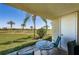 Relaxing patio with seating and views of the lush green golf course at 6191 Bahia Del Mar Blvd # 103, St Petersburg, FL 33715