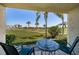 Enjoy golf course views from this condo's private patio seating area at 6191 Bahia Del Mar Blvd # 103, St Petersburg, FL 33715