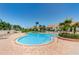 Inviting community pool surrounded by lush landscaping and comfortable lounging areas at 6191 Bahia Del Mar Blvd # 103, St Petersburg, FL 33715