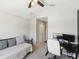 Cozy bedroom with neutral tones, daybed, and modern desk setup at 6910 Rock Springs Way, Tampa, FL 33625
