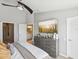 Bright main bedroom with gray walls and furniture, and an en suite bathroom at 6910 Rock Springs Way, Tampa, FL 33625