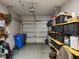 Organized garage space with ample storage solutions and a functional layout at 6910 Rock Springs Way, Tampa, FL 33625
