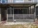 This screened patio with outdoor seating provides a comfortable space for relaxation at 6910 Rock Springs Way, Tampa, FL 33625