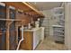 Unfinished basement area with storage and sink at 7802 N 53Rd St, Tampa, FL 33617
