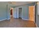 Comfortable bedroom with ample closet space, en-suite bathroom, and neutral tones throughout at 7802 N 53Rd St, Tampa, FL 33617