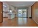 Open floor plan connecting the living room to the kitchen and lanai, perfect for entertaining at 7802 N 53Rd St, Tampa, FL 33617