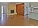 Bright open layout, from fireplace to kitchen, enhances the seamless flow throughout the home at 7802 N 53Rd St, Tampa, FL 33617