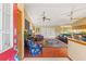 Bright living room boasts hardwood floors, vaulted ceilings, comfortable seating, and an open floor plan at 8195 Wooden Dr, Spring Hill, FL 34606