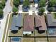 Aerial view of home's roof, fenced backyard and neighborhood at 8603 Sandy Plains Dr, Riverview, FL 33578