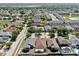 Aerial view of neighborhood with pond at 8603 Sandy Plains Dr, Riverview, FL 33578