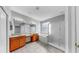 Bright bathroom with double sinks, a soaking tub, and a separate shower at 8603 Sandy Plains Dr, Riverview, FL 33578